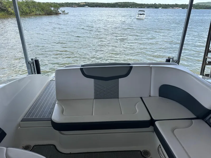 Slide: The Image of 2020 Chaparral 317 SSX boat interior with lake view in the background. - 20
