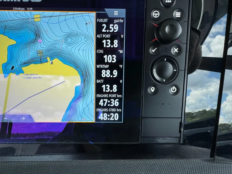 Slide: The Image of Boat navigation display on a 2020 Chaparral 317 SSX showing map and engine data. - 30