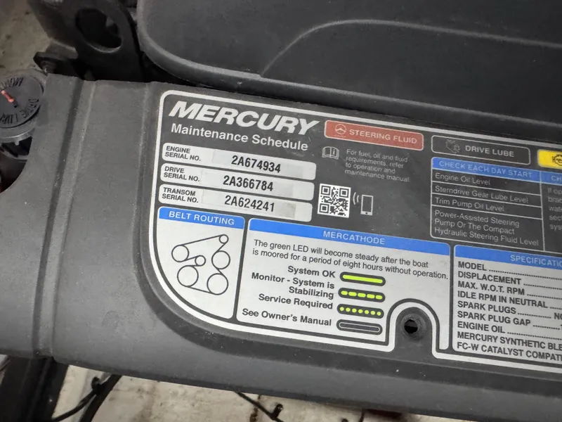 Slide: The Image of Mercury maintenance schedule label on a 2020 Chaparral 317 SSX boat engine. - 36