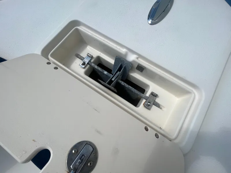 Slide: The Image of Anchor storage compartment on a 2011 Parker 21SE Center Console boat. - 11