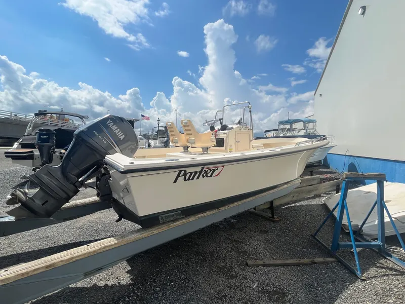 Slide: The Image of 2011 Parker 21SE Center Console boat on trailer with Yamaha outboard motor. - 34