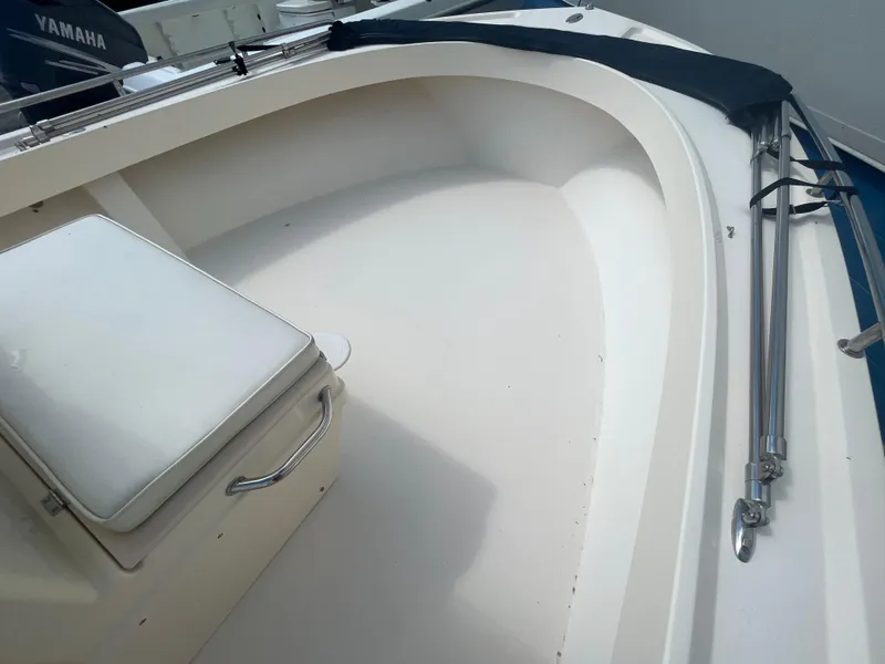 Slide: The Image of 2011 Parker 21SE Center Console boat interior with Yamaha engine visible. - 9