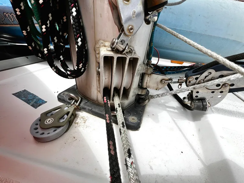 Slide: The Image of Close-up of rigging and pulleys on a 1988 Hunter 40 sailboat deck. - 12