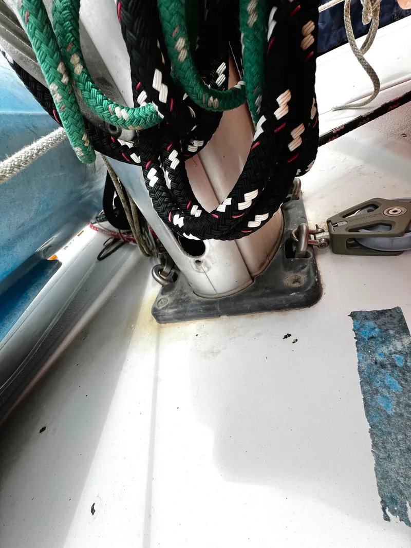 Slide: The Image of Close-up of ropes and mast base on a 1988 Hunter 40 sailboat deck. - 13