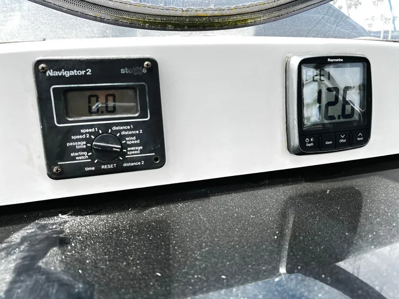 Slide: The Image of Control panel of a 1988 Hunter 40 sailboat with navigation instruments. - 15