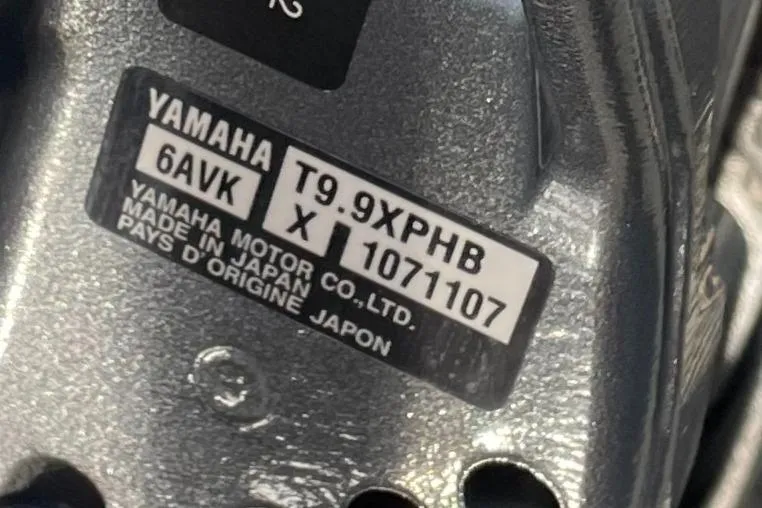 Slide: The Image of Yamaha motor label, model T9.9XPHB, serial 1071107, made in Japan. - 7