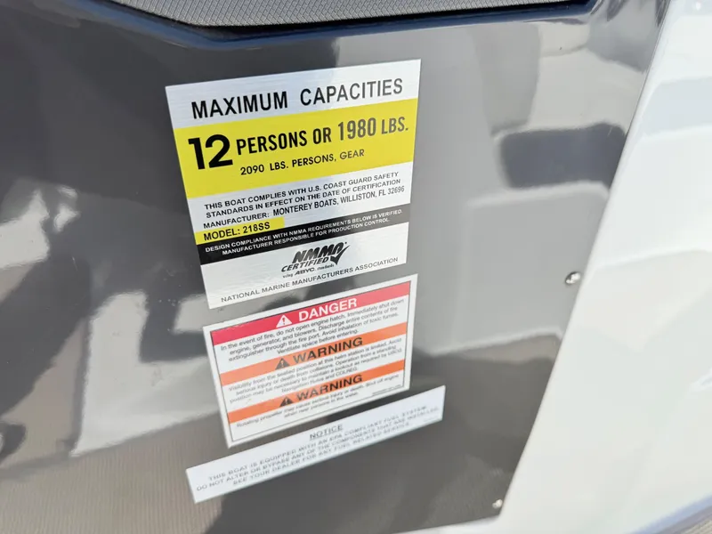 Slide: The Image of Capacity label on 2018 Monterey 218 Super Sport boat, indicating 12 persons or 1980 lbs. - 20