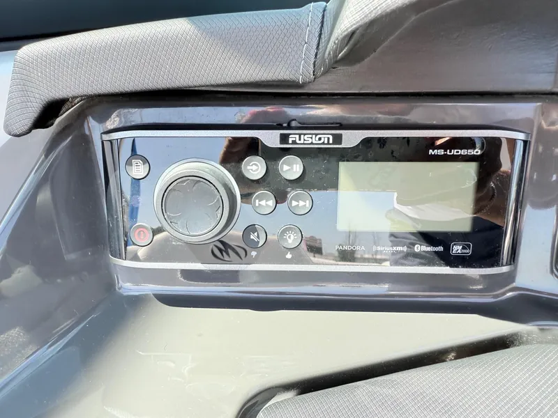 Slide: The Image of Fusion MS-UD650 audio system on 2018 Monterey 218 Super Sport boat dashboard. - 21