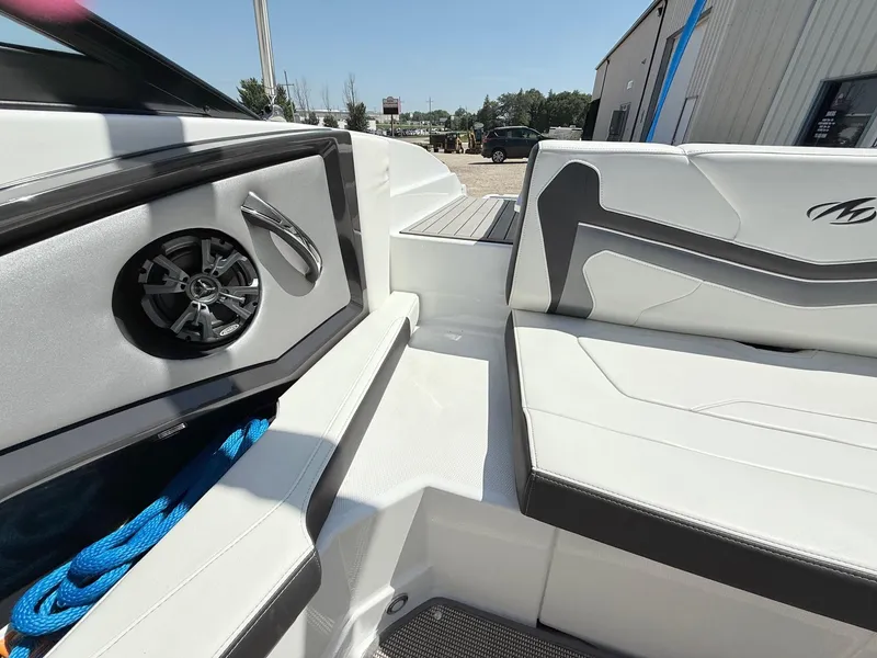 Slide: The Image of Interior of a 2018 Monterey 218 Super Sport boat with seating and speaker. - 28