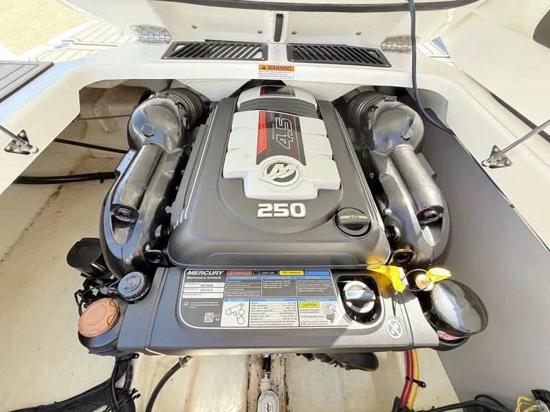 Slide: The Image of 2018 Monterey 218 Super Sport boat engine, featuring a Mercury 4.5L 250 horsepower motor. - 29