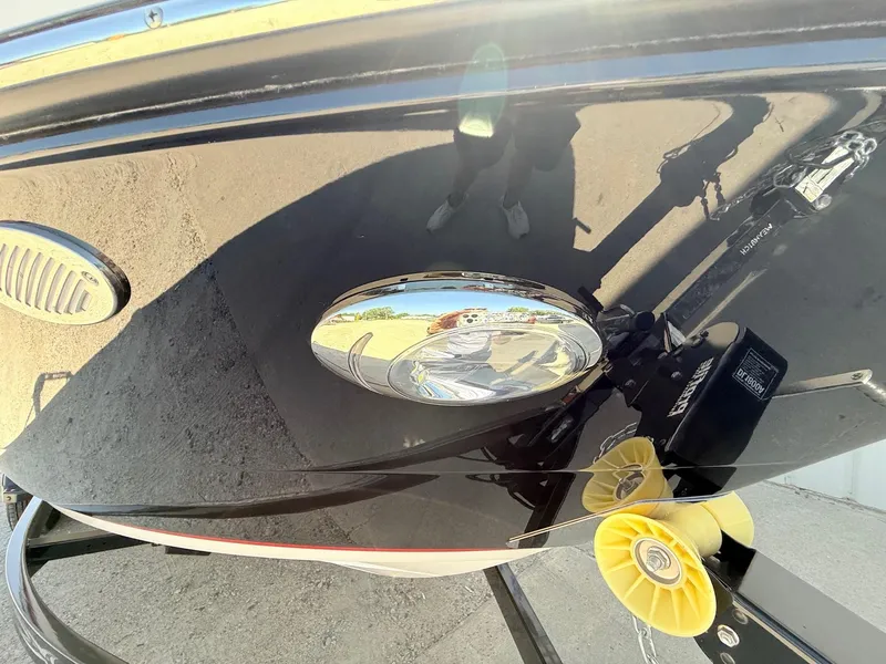Slide: The Image of Close-up of a 2018 Monterey 218 Super Sport boat hull with reflection and trailer. - 3