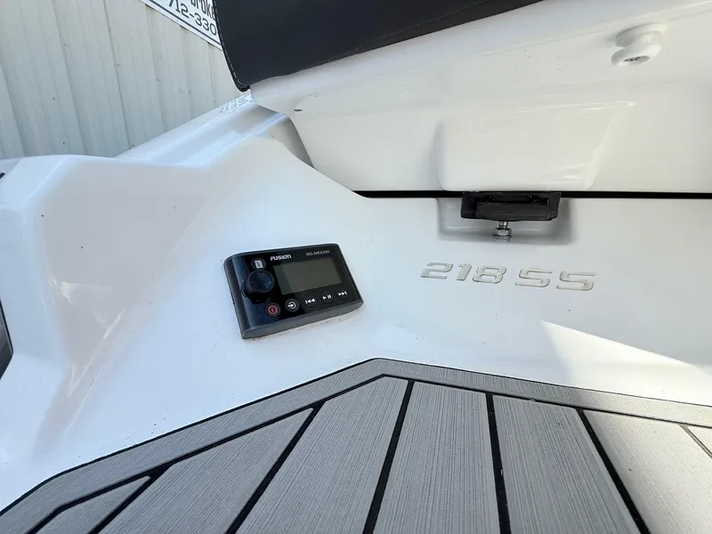 Slide: The Image of 2018 Monterey 218 Super Sport boat with Fusion audio system on deck. - 33