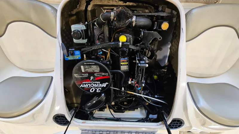 Slide: The Image of Engine compartment of a 2005 Sea Ray 180 Sport with Mercury 3.0 motor. - 17