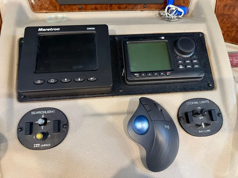 Slide: The Image of Control panel of a 2001 Bayliner 5288 Pilot House Motoryacht with navigation and lighting controls. - 35