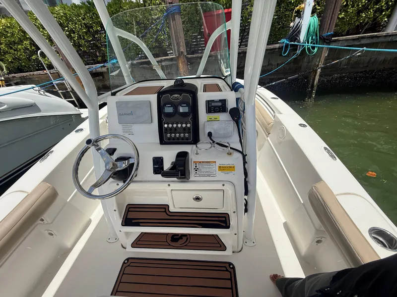Slide: The Image of 2017 Sea Fox 226 Commander boat cockpit with steering wheel and control panel. - 3