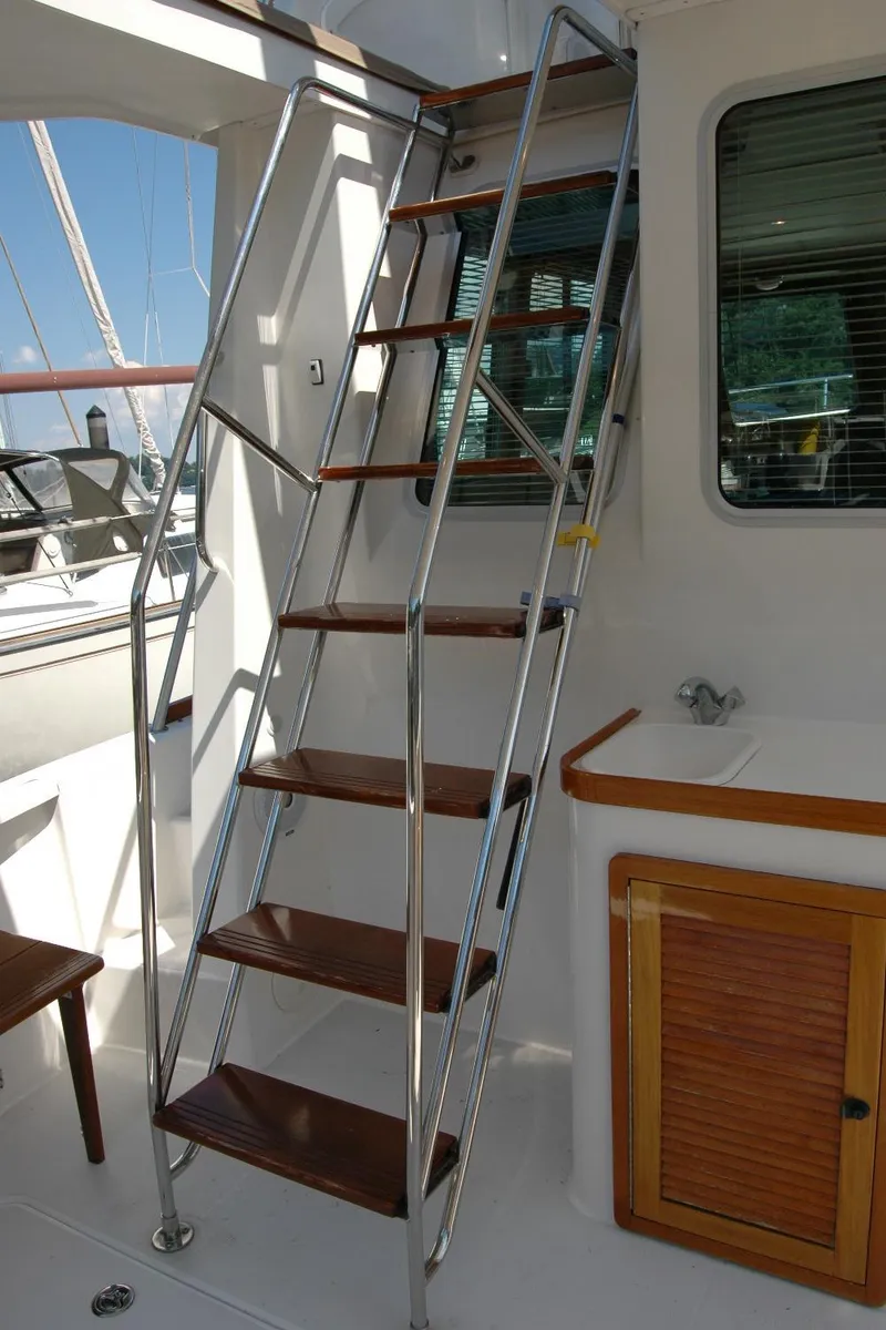 Slide: The Image of Stainless steel ladder on 2006 Sabre 36 Flybridge Sedan yacht, leading to upper deck. - 23