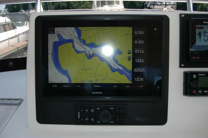 Slide: The Image of Garmin navigation display on 2006 Sabre 36 Flybridge Sedan boat dashboard. - 38