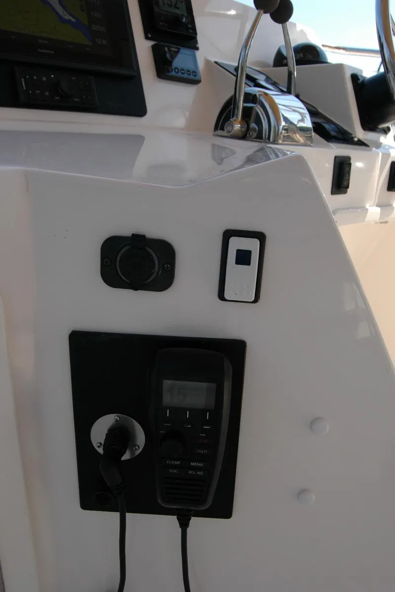 Slide: The Image of Control panel of 2006 Sabre 36 Flybridge Sedan with navigation and communication equipment. - 40