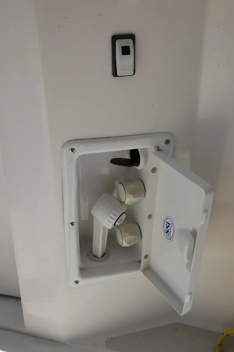 Slide: The Image of Boat water hookup compartment on a 2006 Sabre 36 Flybridge Sedan. - 48