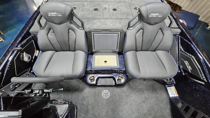 Slide: The Image of 2025 Skeeter ZXR 21 boat interior with dual seats and control panel. - 21
