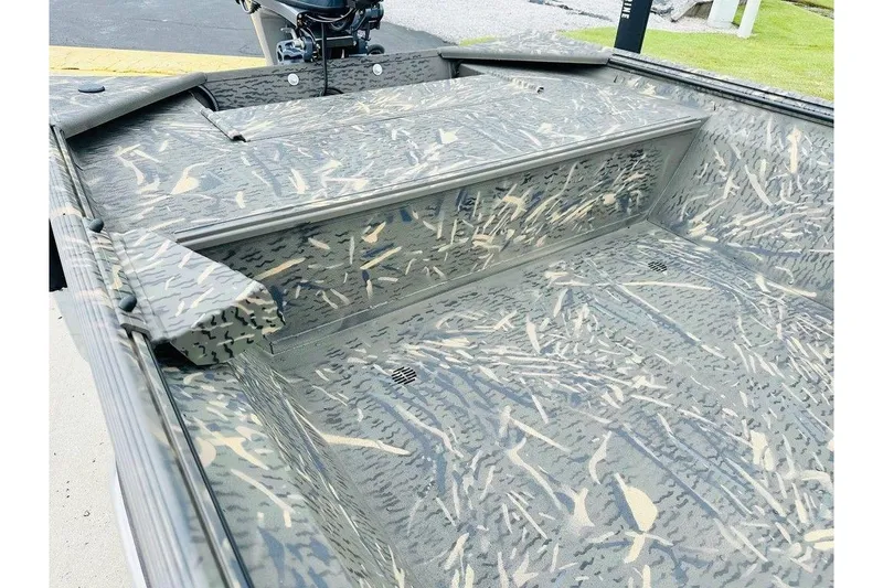 Slide: The Image of 2026 War Eagle 754LDV boat interior with camouflage pattern design. - 6