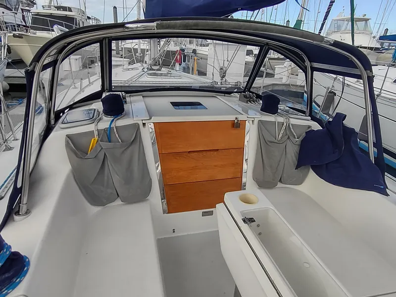 Slide: The Image of Cockpit of 2002 Catalina 36 MkII sailboat with storage and seating. - 17