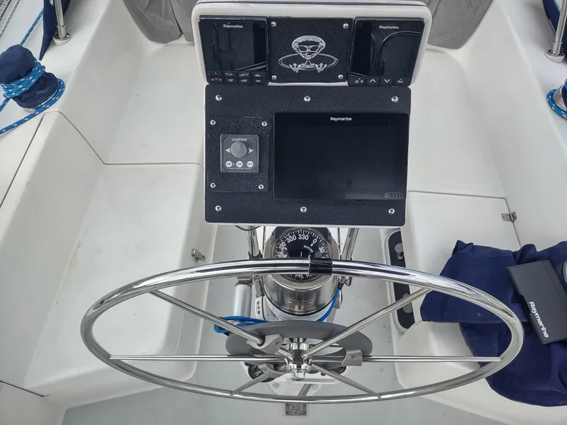 Slide: The Image of Steering wheel and navigation equipment on a 2002 Catalina 36 MkII sailboat. - 21