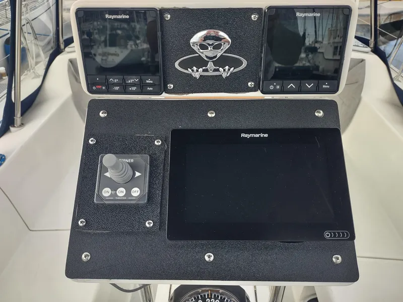 Slide: The Image of Control panel of a 2002 Catalina 36 MkII sailboat with Raymarine navigation equipment. - 22