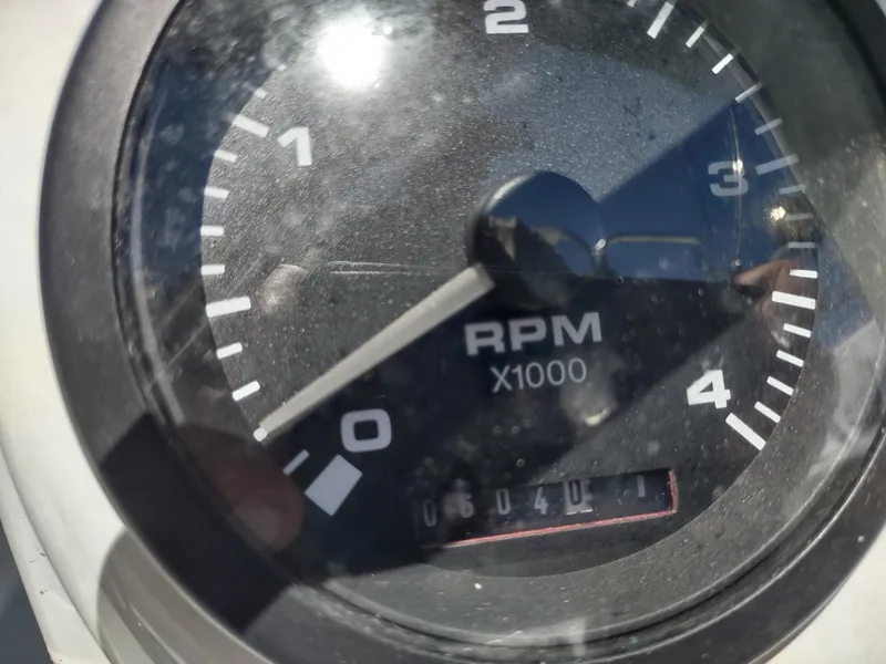 Slide: The Image of Close-up of a Catalina 36 MkII 2002 tachometer showing RPM and engine hours. - 44