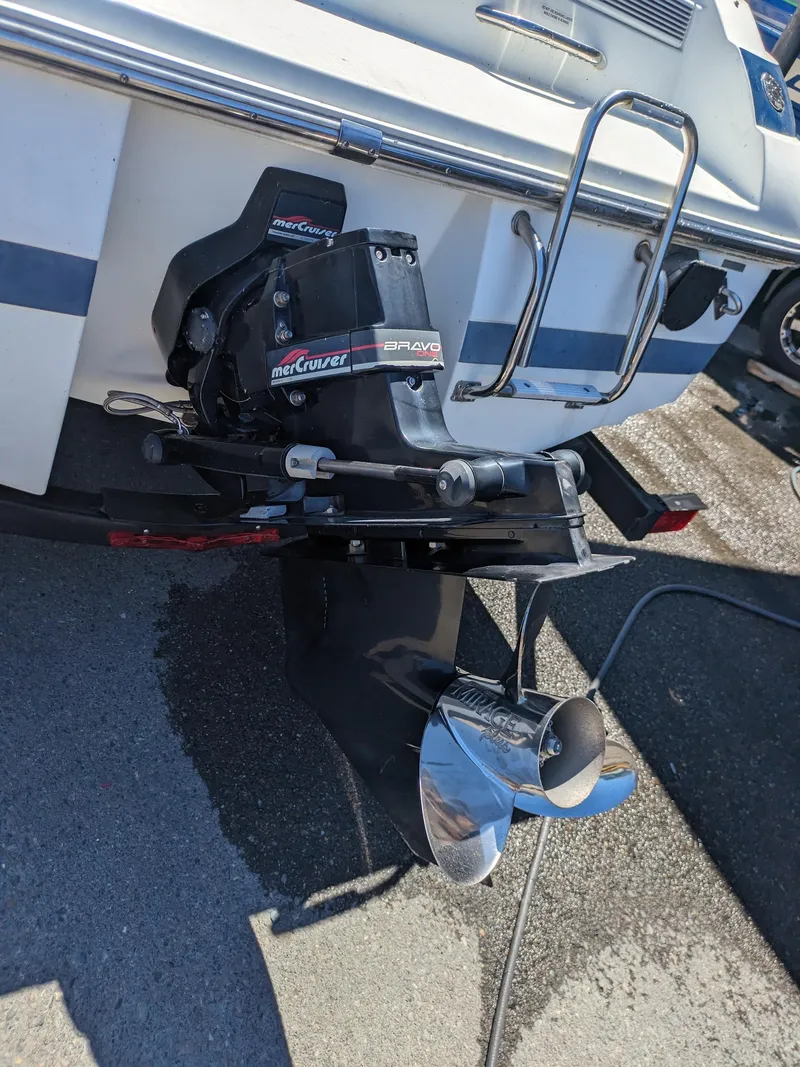 Slide: The Image of 1998 Cobalt 200 boat with MerCruiser Bravo outdrive on a sunny day. - 21