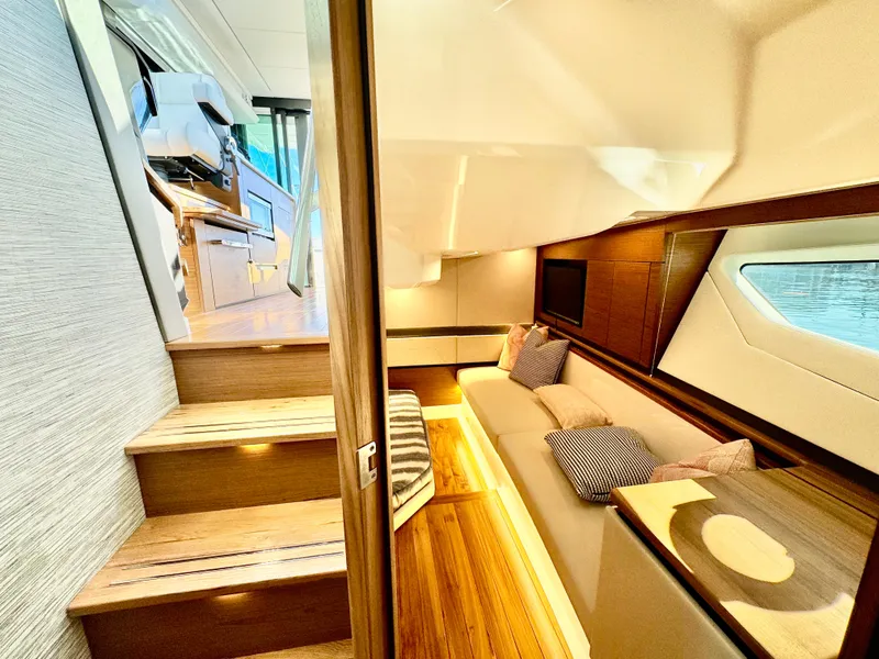 Slide: The Image of Luxurious interior of 2025 Tiara Yachts 43 LE, featuring elegant seating and modern design. - 32