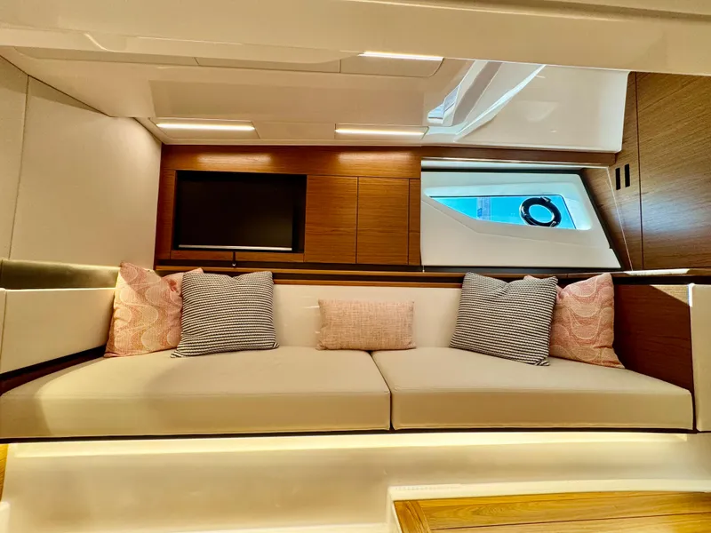 Slide: The Image of Luxurious interior of 2025 Tiara Yachts 43 LE with cozy seating and modern design. - 36