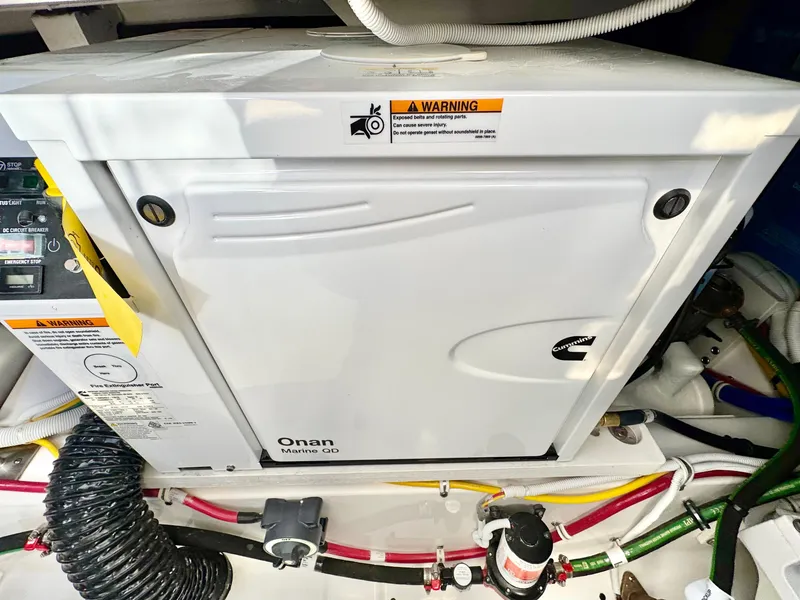 Slide: The Image of Onan Marine QD generator in 2025 Tiara Yachts 43 LE engine room. - 49