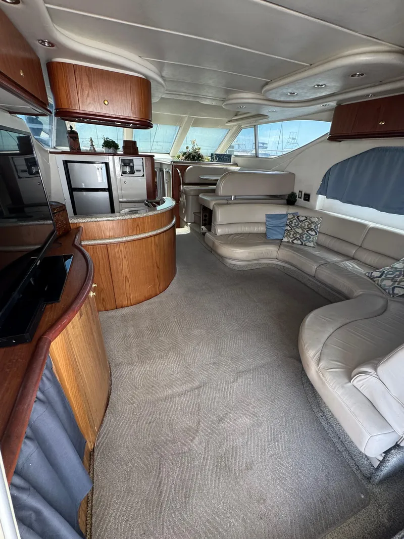 Slide: The Image of Luxurious interior of a 1998 Maxum 4600 SCB yacht with modern amenities. - 34