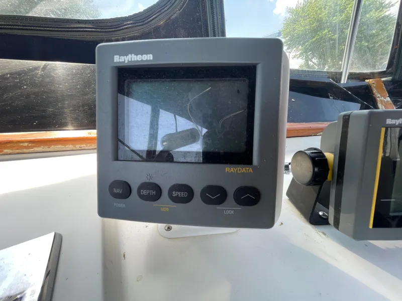 Slide: The Image of Raytheon marine navigation display on 1982 Californian 34 LRC boat dashboard. - 20