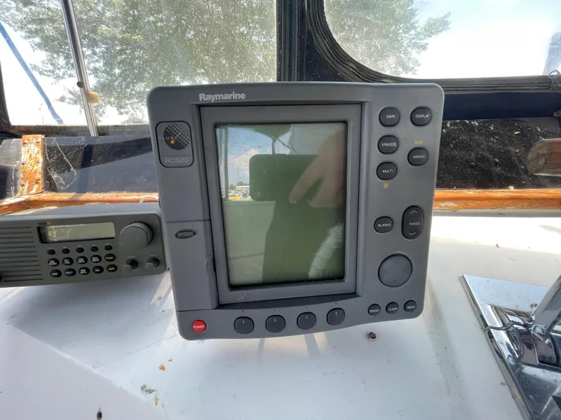 Slide: The Image of Raymarine RC520 marine navigation system on 1982 Californian 34 LRC boat dashboard. - 21