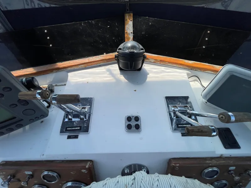 Slide: The Image of Control panel of a 1982 Californian 34 LRC boat with navigation instruments. - 23