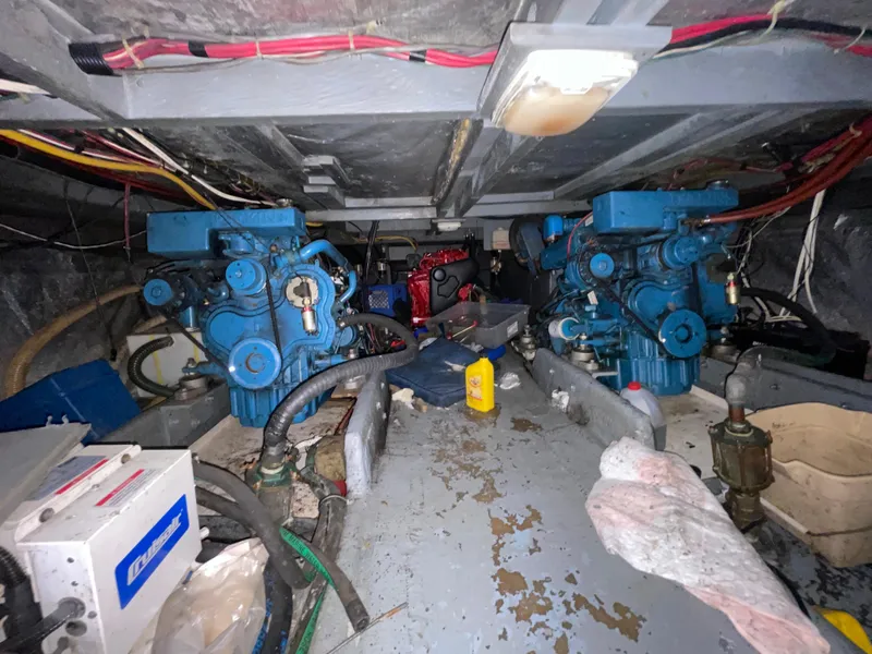 Slide: The Image of Engine room of 1982 Californian 34 LRC with dual blue engines and wiring. - 42