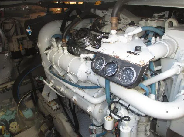 Slide: The Image of Engine room of 1994 Sea Ray 500 Sundancer with visible gauges and piping. - 17