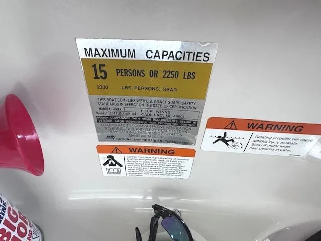 Slide: The Image of 2003 Four Winns 264 Funship capacity warning label, maximum 15 persons or 2250 lbs. - 20