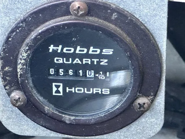 Slide: The Image of Hobbs Quartz hour meter showing 561 hours on a 2003 Four Winns 264 Funship. - 23
