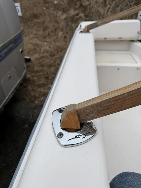 Slide: The Image of 2011 Grady-White 208 Adventure boat detail with wooden handle and metal fitting. - 21