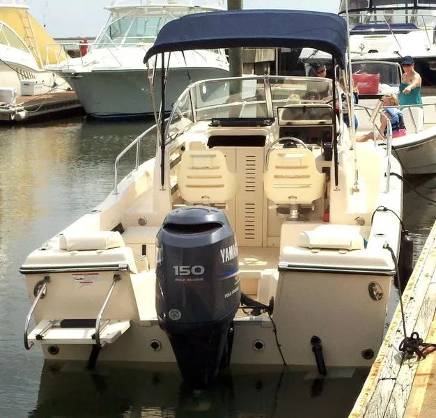Slide: The Image of 2011 Grady-White 208 Adventure boat docked with Yamaha 150 engine. - 4