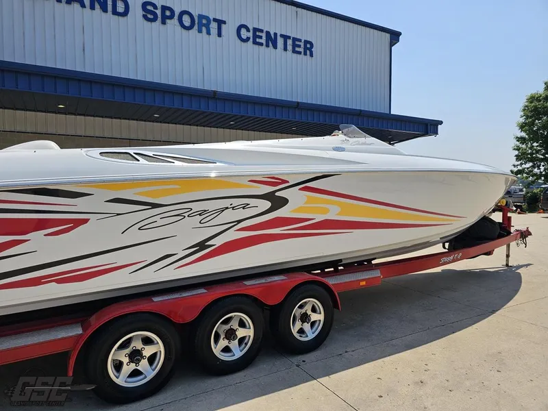 Slide: The Image of 2005 Baja 33 Outlaw speedboat on trailer at Grand Sport Center. - 10