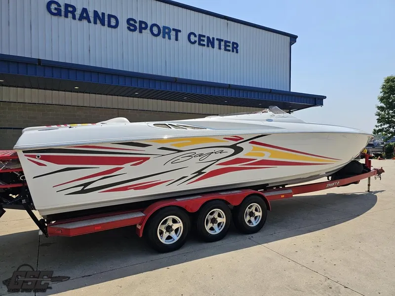 Slide: The Image of 2005 Baja 33 Outlaw speedboat on trailer at Grand Sport Center. - 11