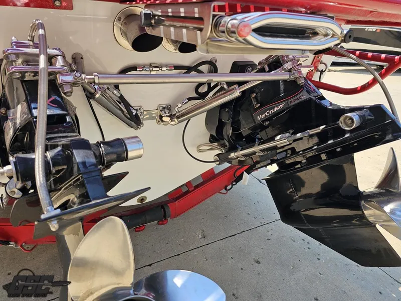 Slide: The Image of 2005 Baja 33 Outlaw boat with MerCruiser Bravo One outdrive and stainless steel propellers. - 33