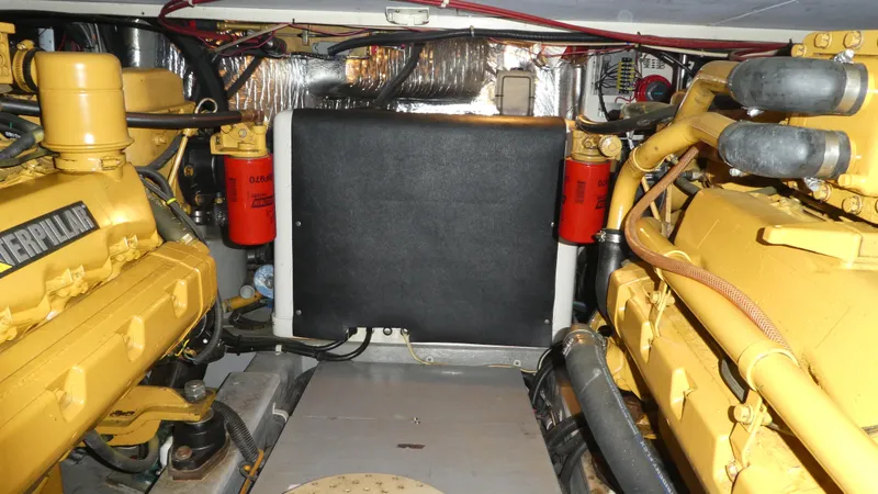 Slide: The Image of Engine room of a 1995 Riviera Convertible with Caterpillar engines and visible components. - 31