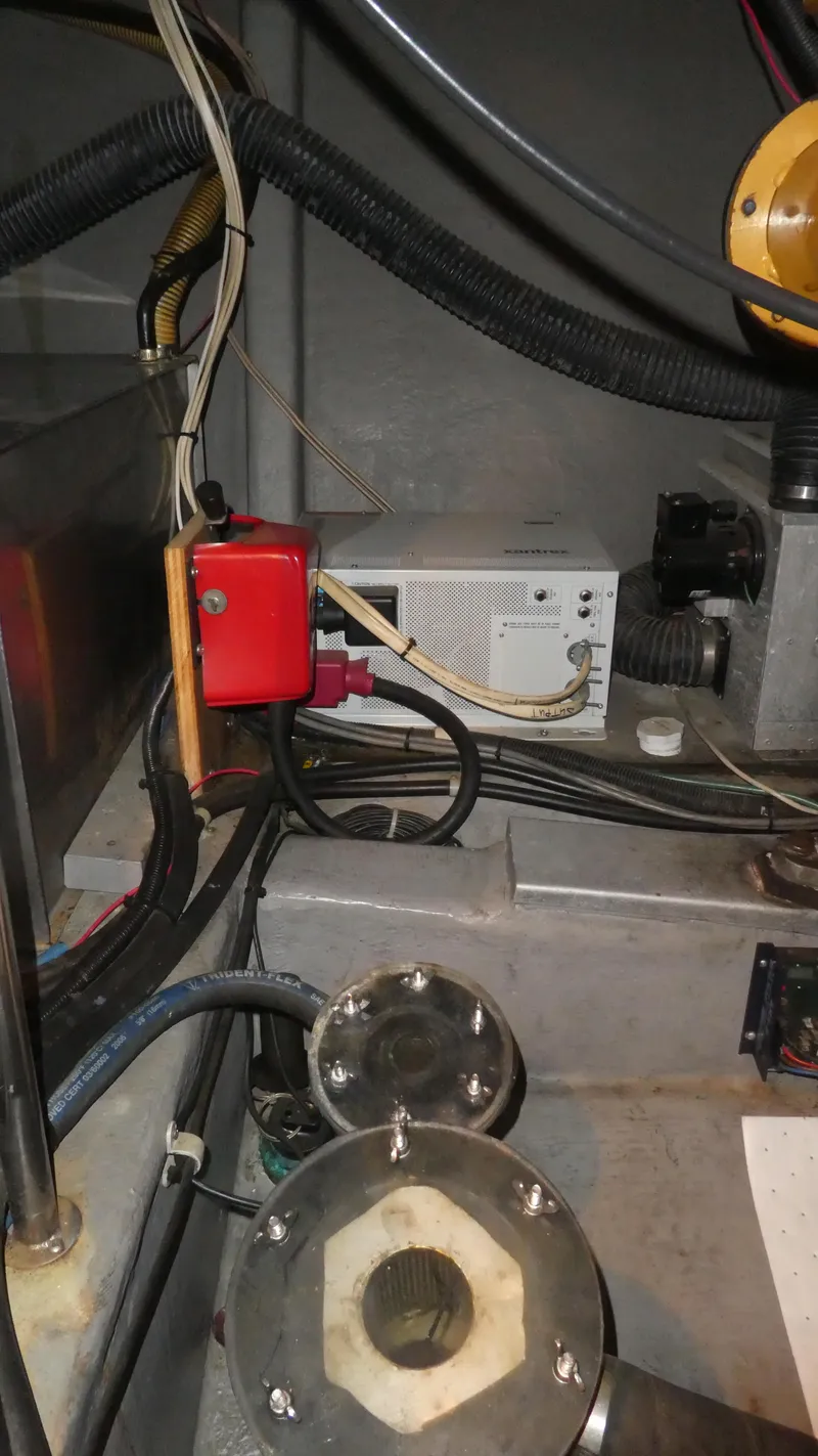 Slide: The Image of Engine compartment of a 1995 Riviera Convertible with wiring and mechanical components. - 40