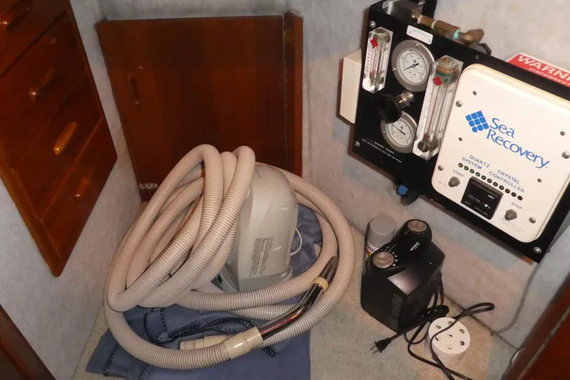 Slide: The Image of 1995 Riviera Convertible interior with Sea Recovery system and coiled hose. - 41