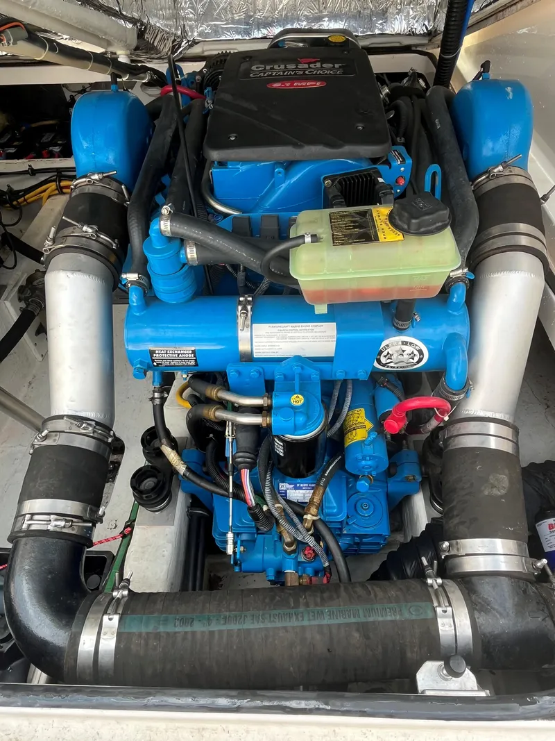 Slide: The Image of Engine of a 2005 Tiara Yachts 2900 Coronet, featuring Crusader Captain's Choice components. - 11